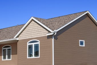 Home with Brown Siding and Roof Shingles